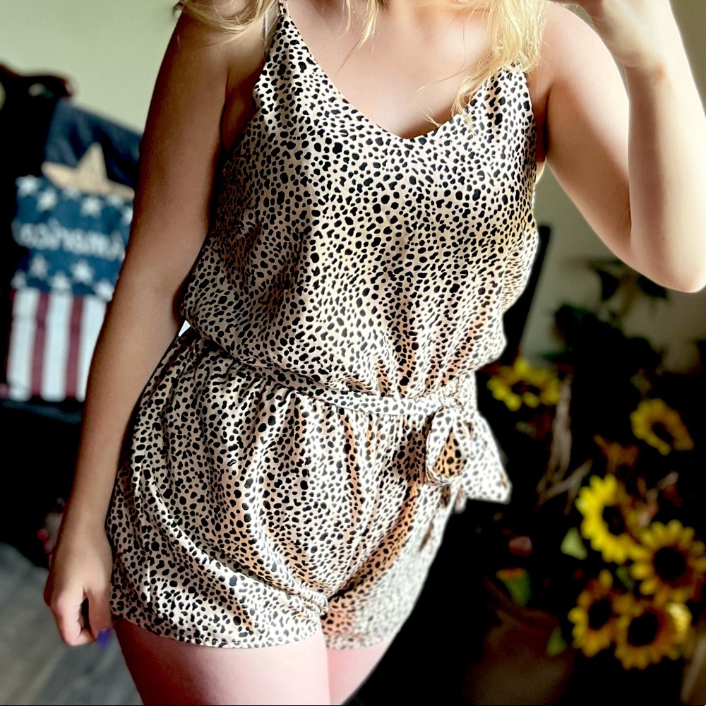 Pink Lily. Cheetah romper. 🐆